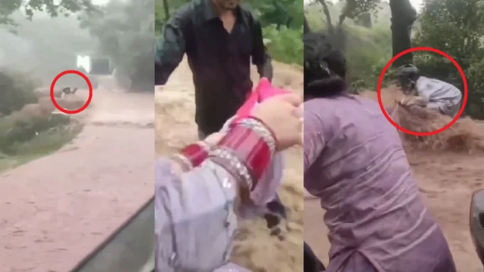 couple saves biker from floods couple saves biker from floods