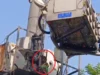 Woman climbs up tower, creates major commotion in the middle of the city woman climbs tower