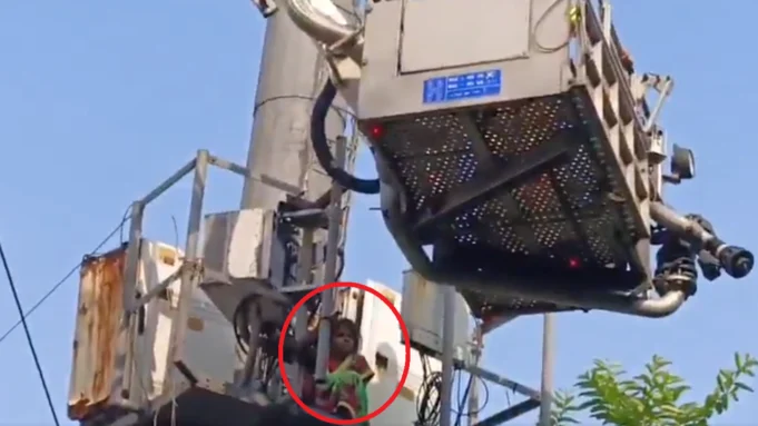 woman climbs tower woman climbs tower